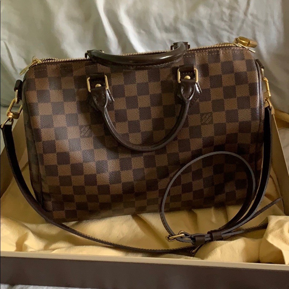SOLD. LV Speedy bandoliere 30